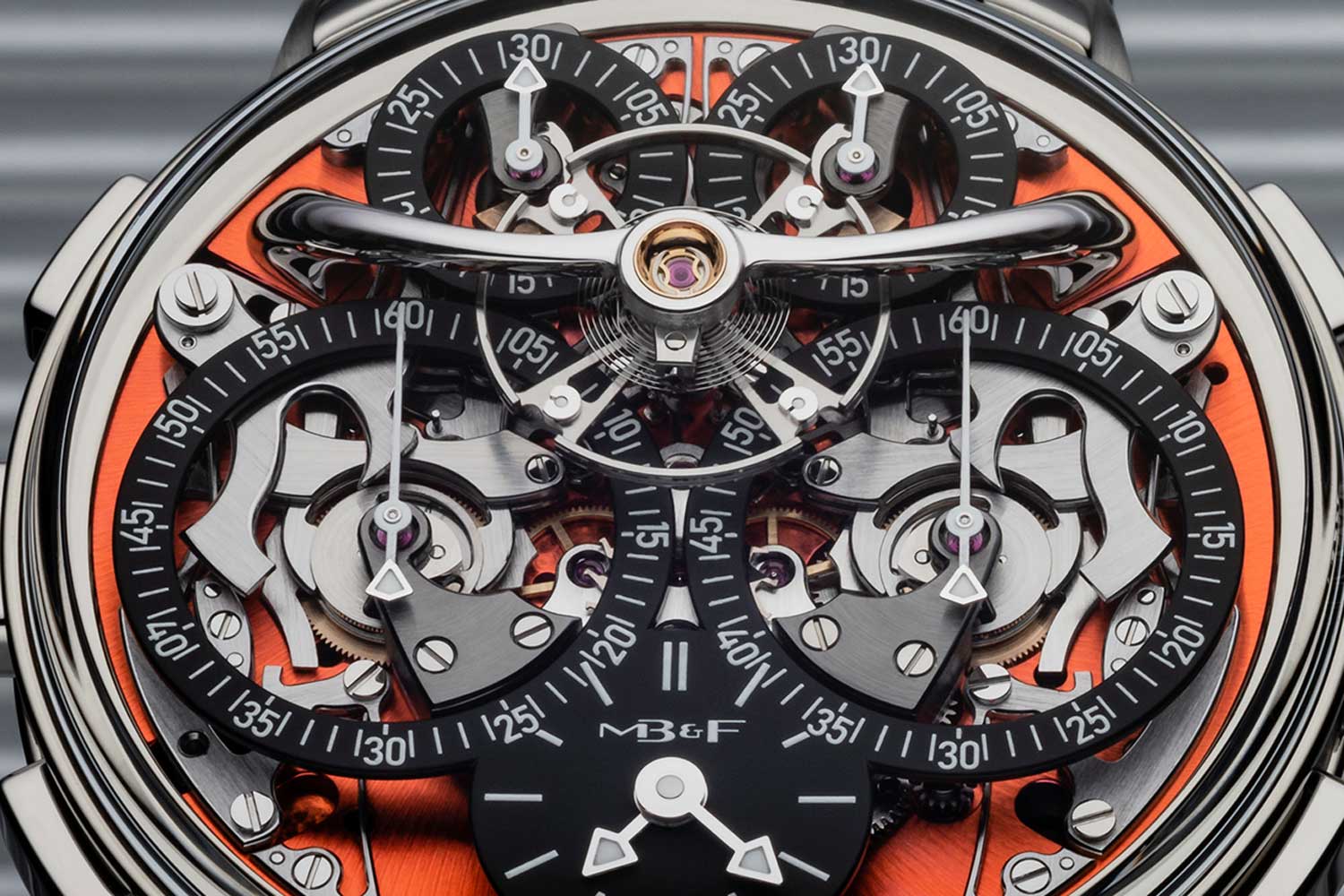 The dial features with two symmetrical, openworked chronograph displays