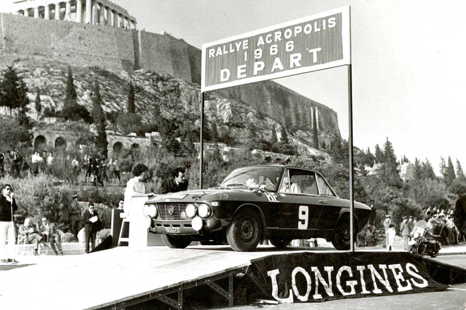 In 1955, Longines launched a special punch printing device called Printogines, that when used with a clock, allowed the rally car racers to punch their own control card at each checkpoint, like at the Rallye Acropolis in Greece