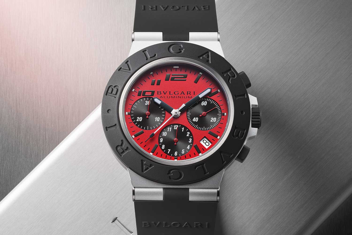 Bvlgari × Ducati collaboration resulting in the Bvlgari Aluminum Chronograph Ducati Special Edition featuring an instantly recognizable dial in Ducati matte red color