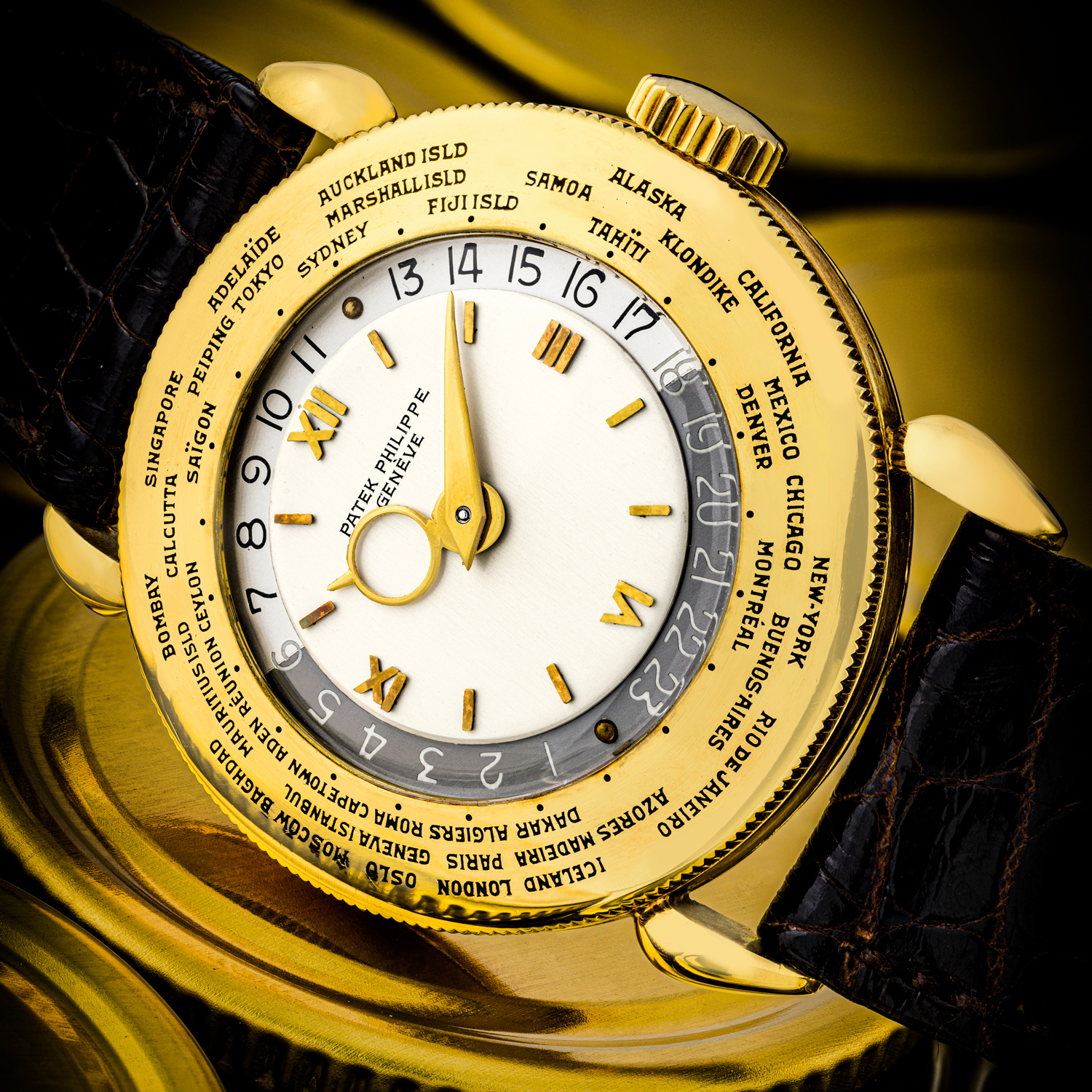 Lot 2521: Patek Philippe 18k Gold Manual Winding World Time Wristwatch, manufactured in 1948