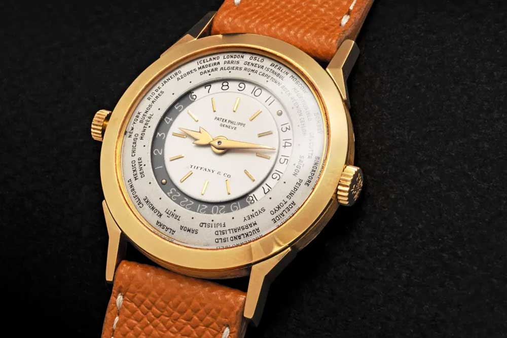 Patek Philippe dual crown world time in yellow gold signed Tiffany & Co