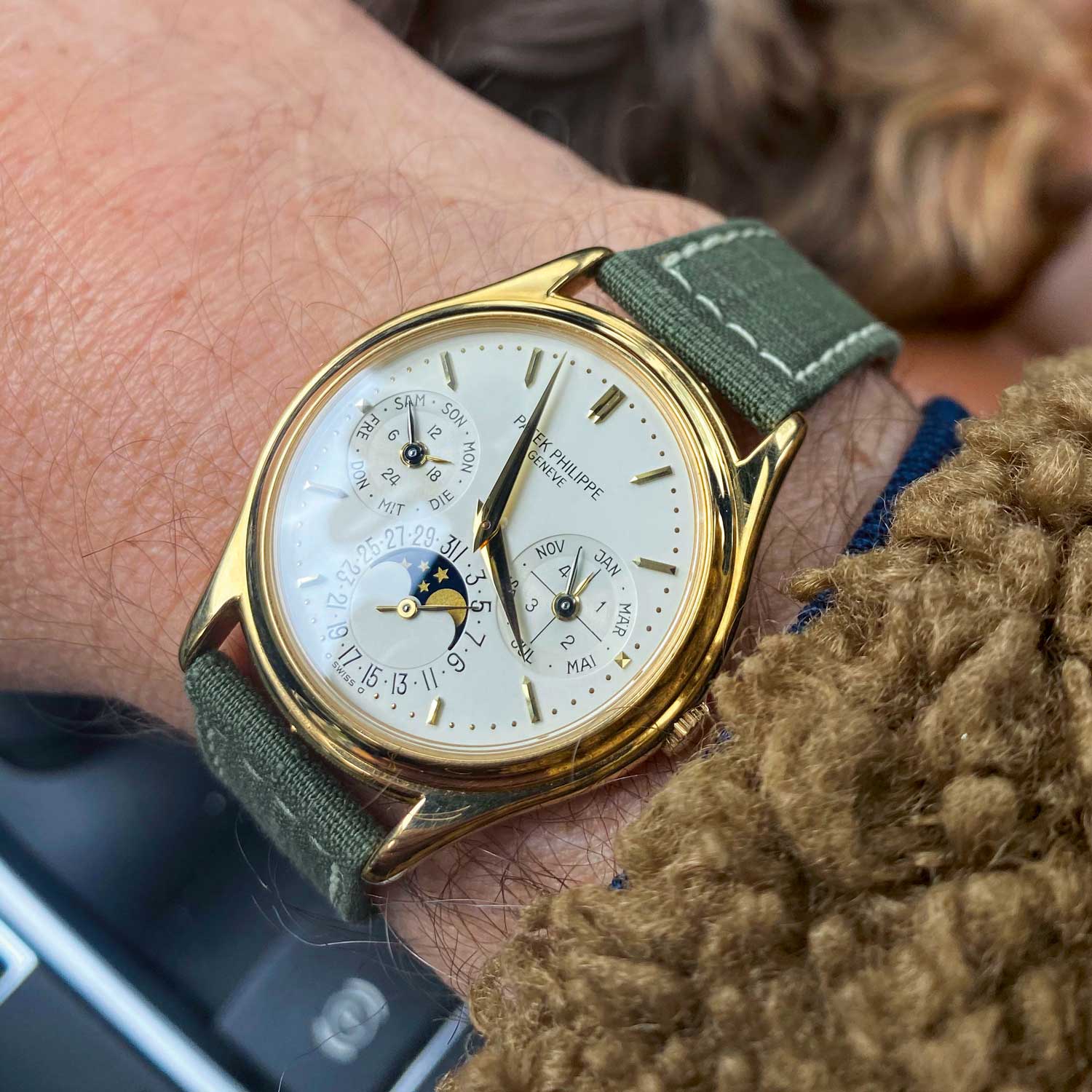Another increasingly sought-after timepiece, a Patek Philippe ref. 3940 exudes sporty elegance when paired with a military-style green textile strap