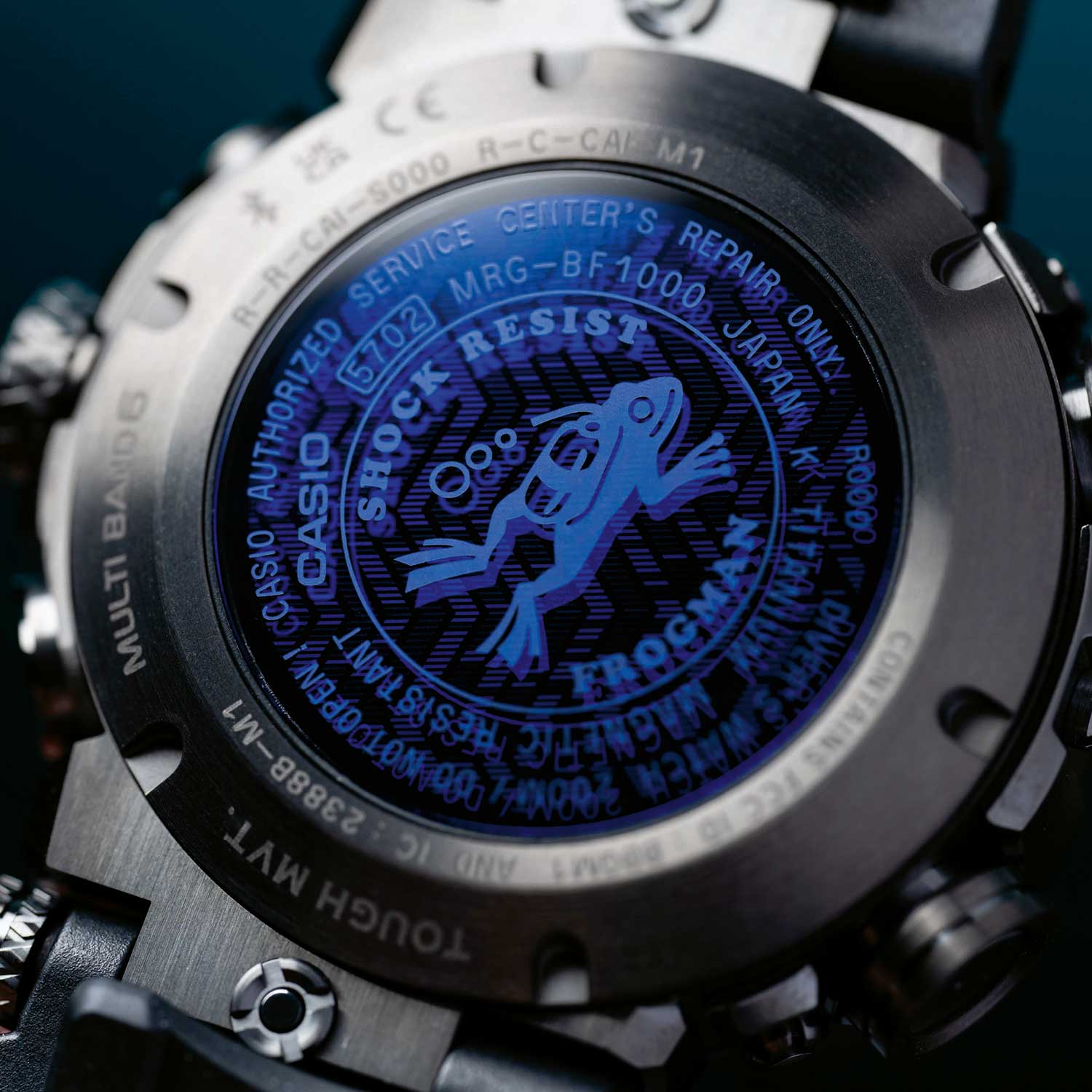 Vibrant blue case back that has a press fit sapphire crystal insert with blue vapor deposition and engraved with the diving frog character from the first-generation of Casio G-SHOCK Frogman watches (Image: Peter Tung)