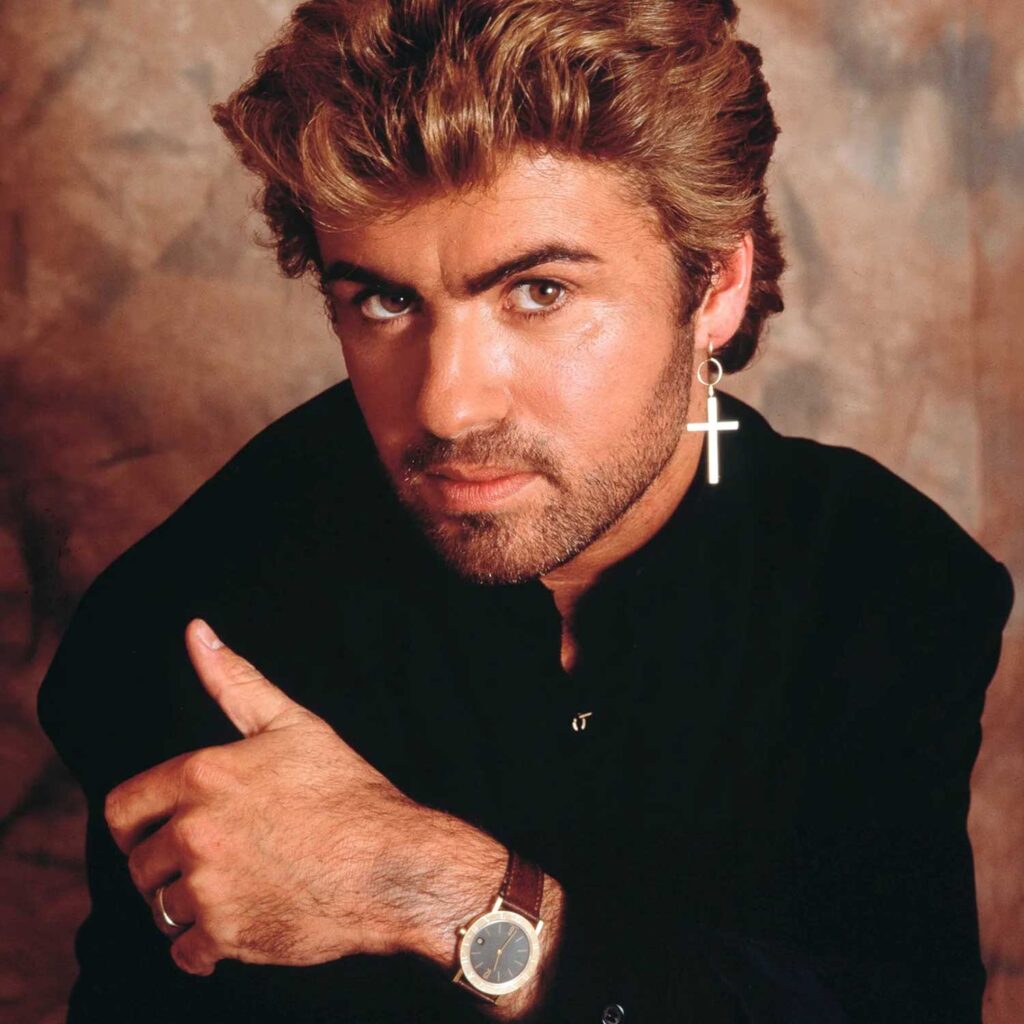 George Michael, studio portrait, London, 1987. (Photo by Michael Putland/Getty Images)
