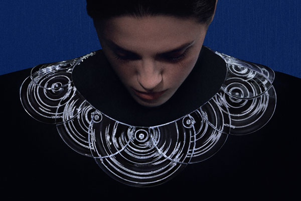 Boucheron logo and a piece of high jewellery on display