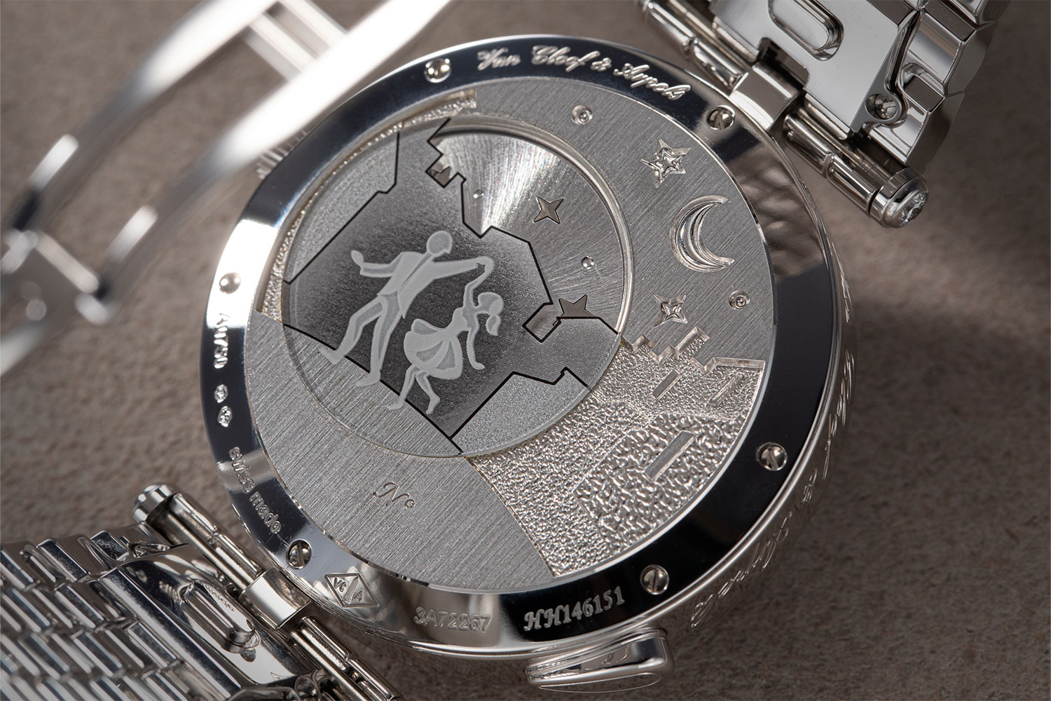 The back of the case presents a similar scene of the couple on the streets of Paris, featuring enamel decal on sapphire glass and engraving. Image: Revolution ©