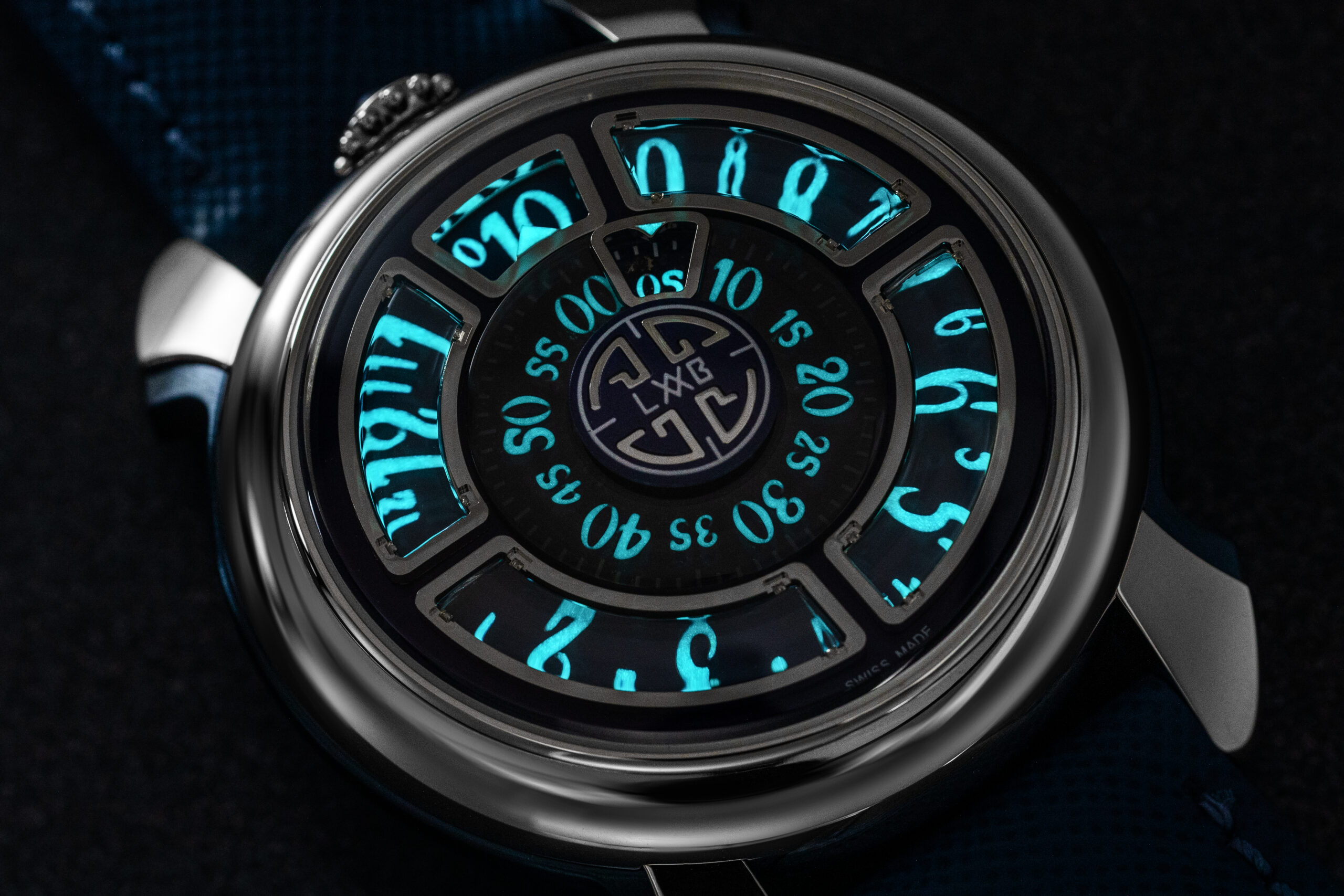 Gagà Laboratorio Labormatic Luce watch glowing in the dark with fully luminescent numerals.
