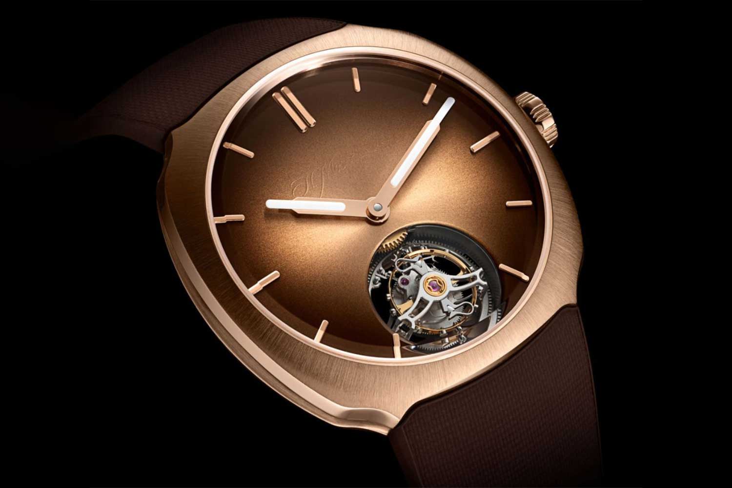 Reference 6805-0410 comes on a textured chocolate brown rubber strap that picks out the warm brown fumé of the dial