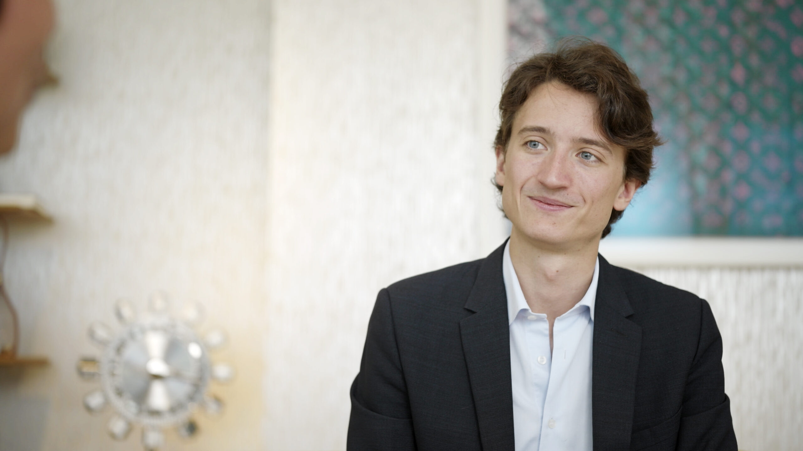Jean Arnault smiling during an interview about La Fabrique du Temps Louis Vuitton and his leadership philosophy, filmed for Man of the Hour