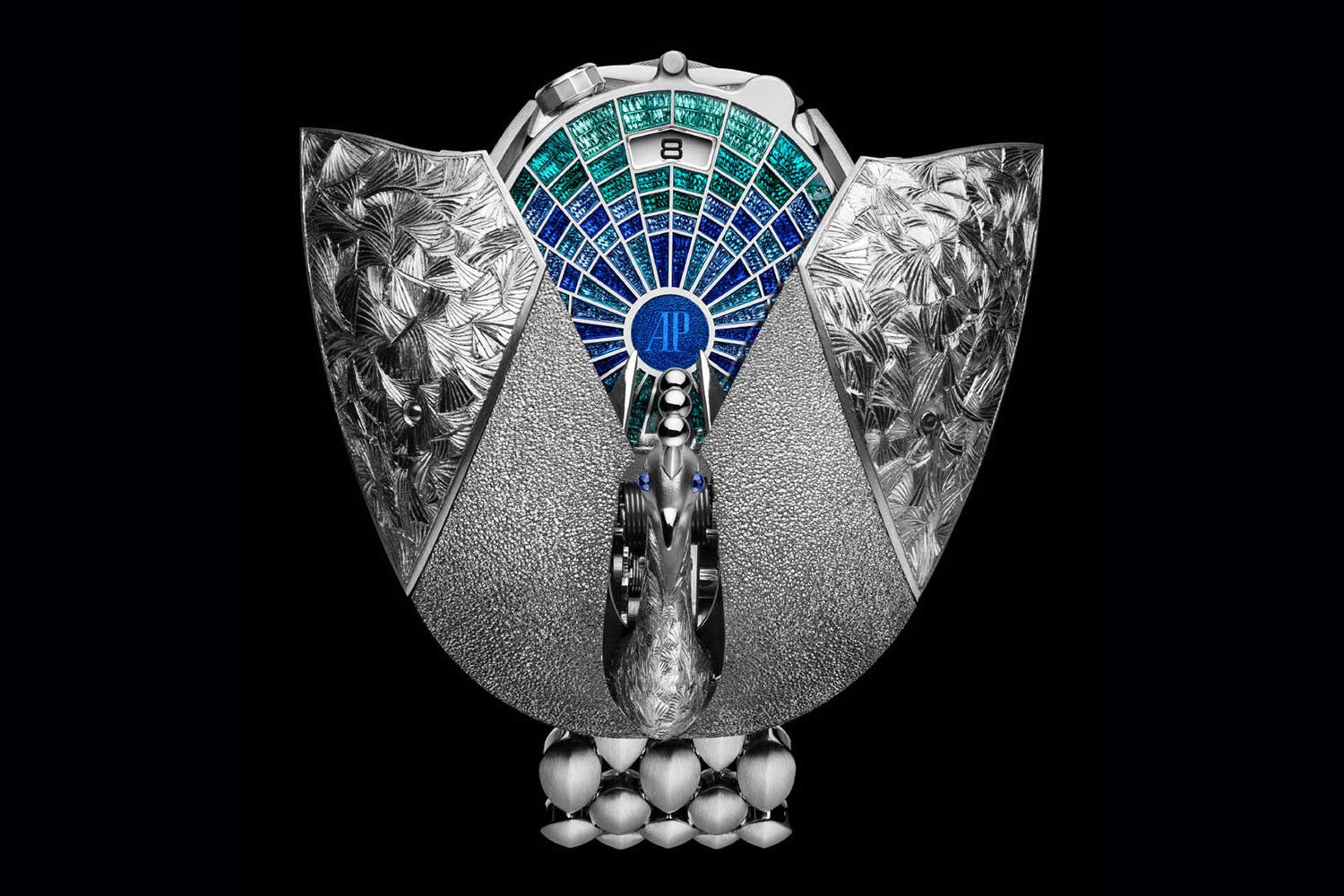 Audemars Piguet Peacock automaton watch with engraved metal wings open, revealing a blue and green gemstone dial in fan pattern