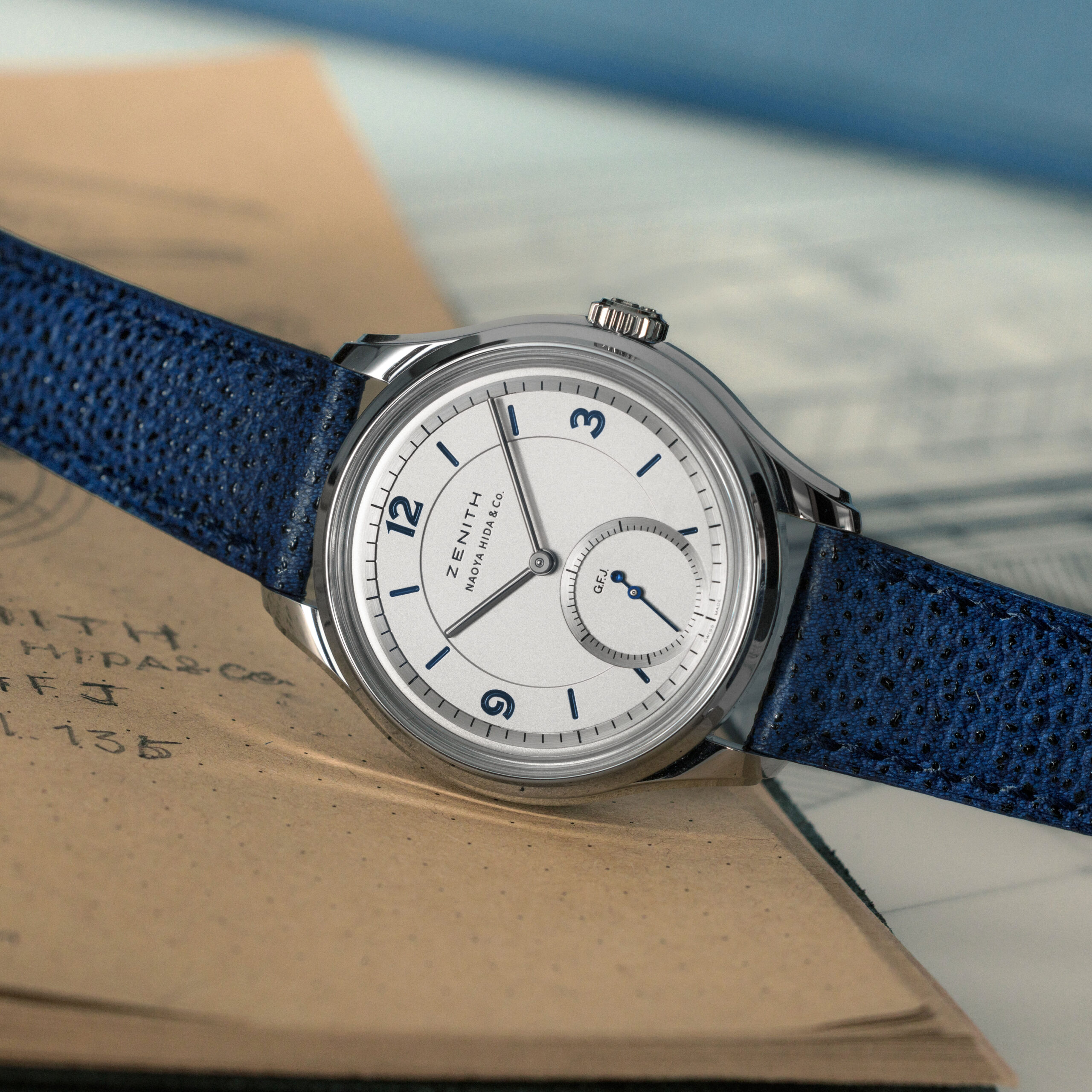 Zenith G.F.J. Calibre 135 Double Signed with Naoya Hida & Co., front dial view on vintage document with blue denim strap