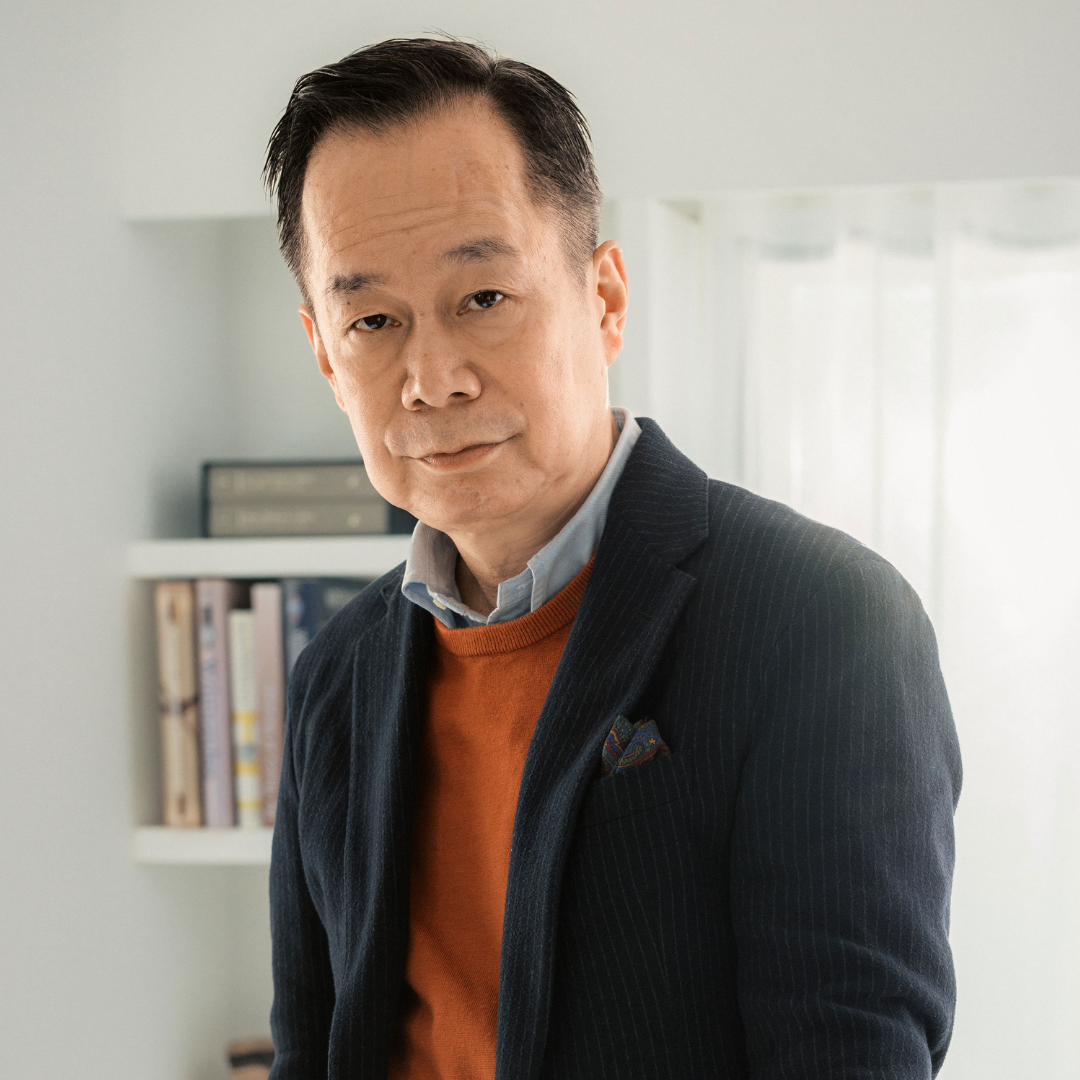 Portrait of Naoya Hida standing at a work table wearing the Zenith x Naoya Hida & Co. G.F.J. Calibre 135