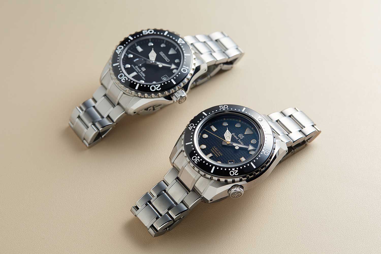 The double-signed SBGA029, a 200m diver powered by the Caliber 9R65 (top) and Grand Seiko